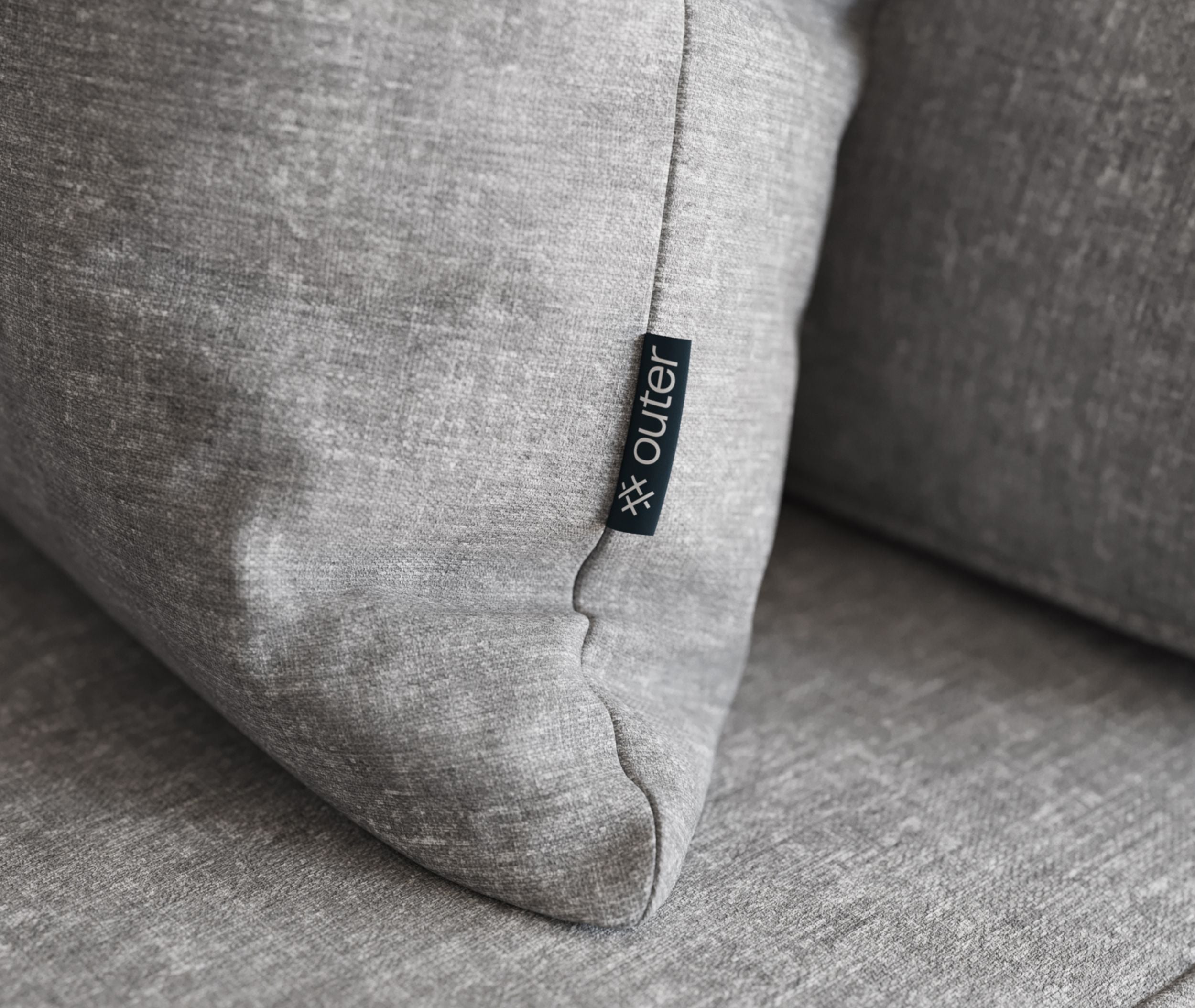 Outdoor throw pillow on a sofa