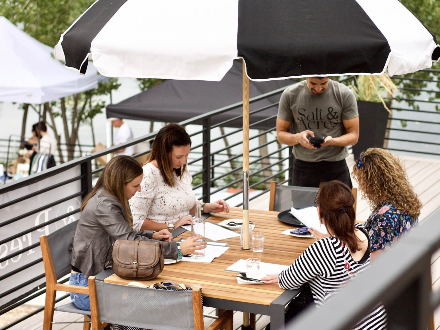 Outer outdoor furniture arranged on a commercial terrace

