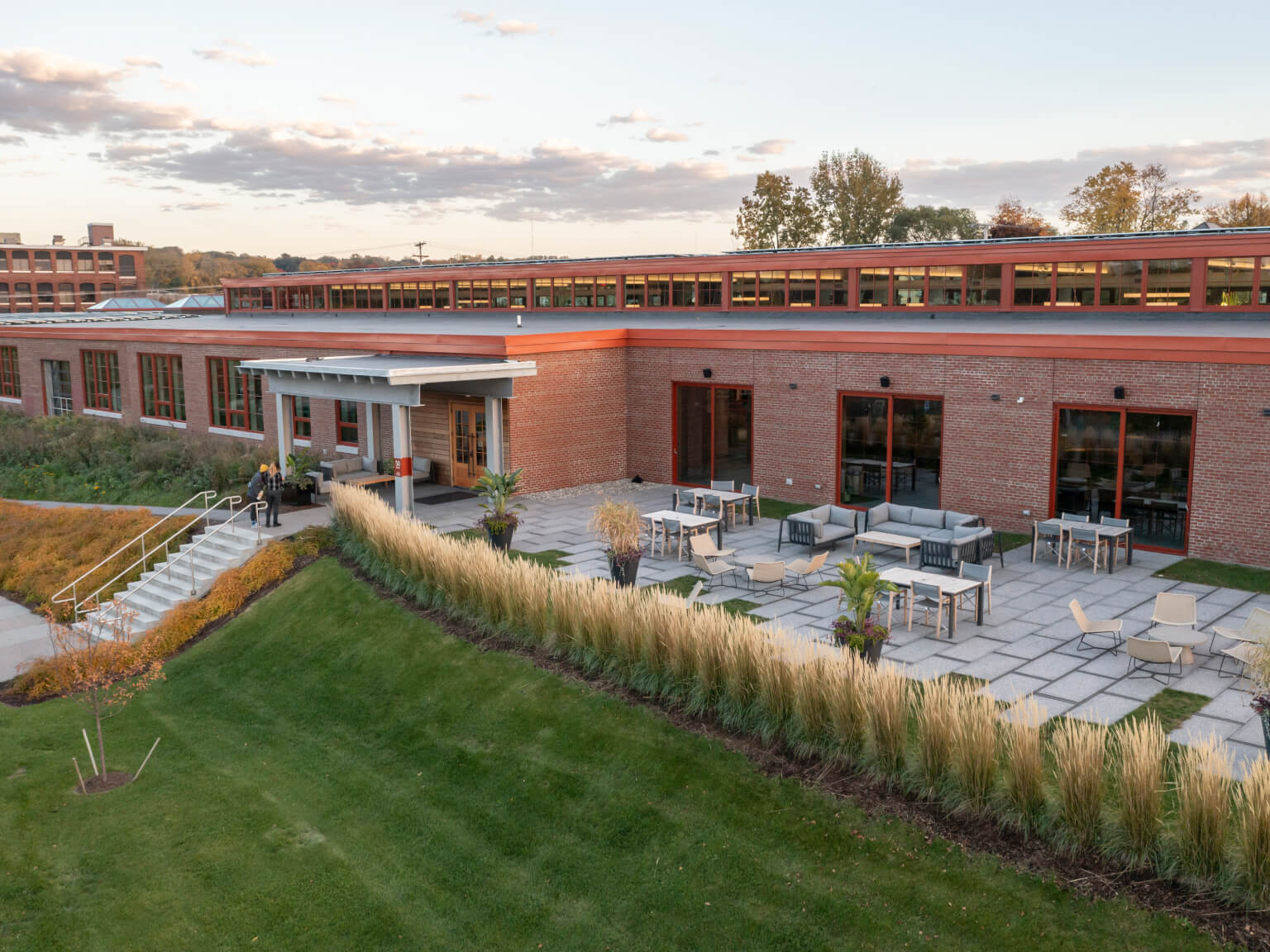 Outer outdoor furniture arranged on a coworking terrace