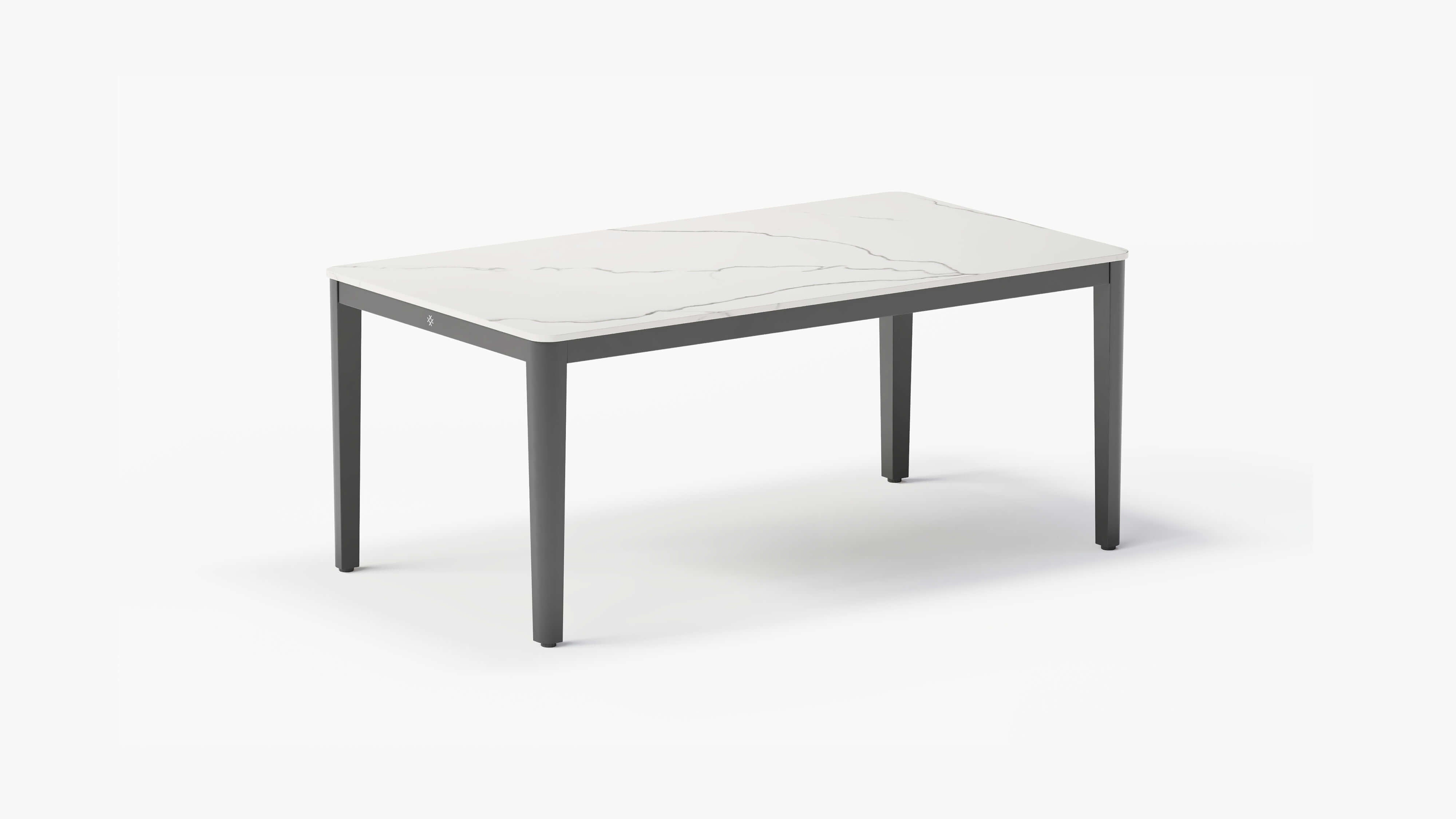 outer-dining table-Charcoal aluminum outdoor dining table with white marble-look sintered stone tabletop shown in a clean studio setting #color_glacier white