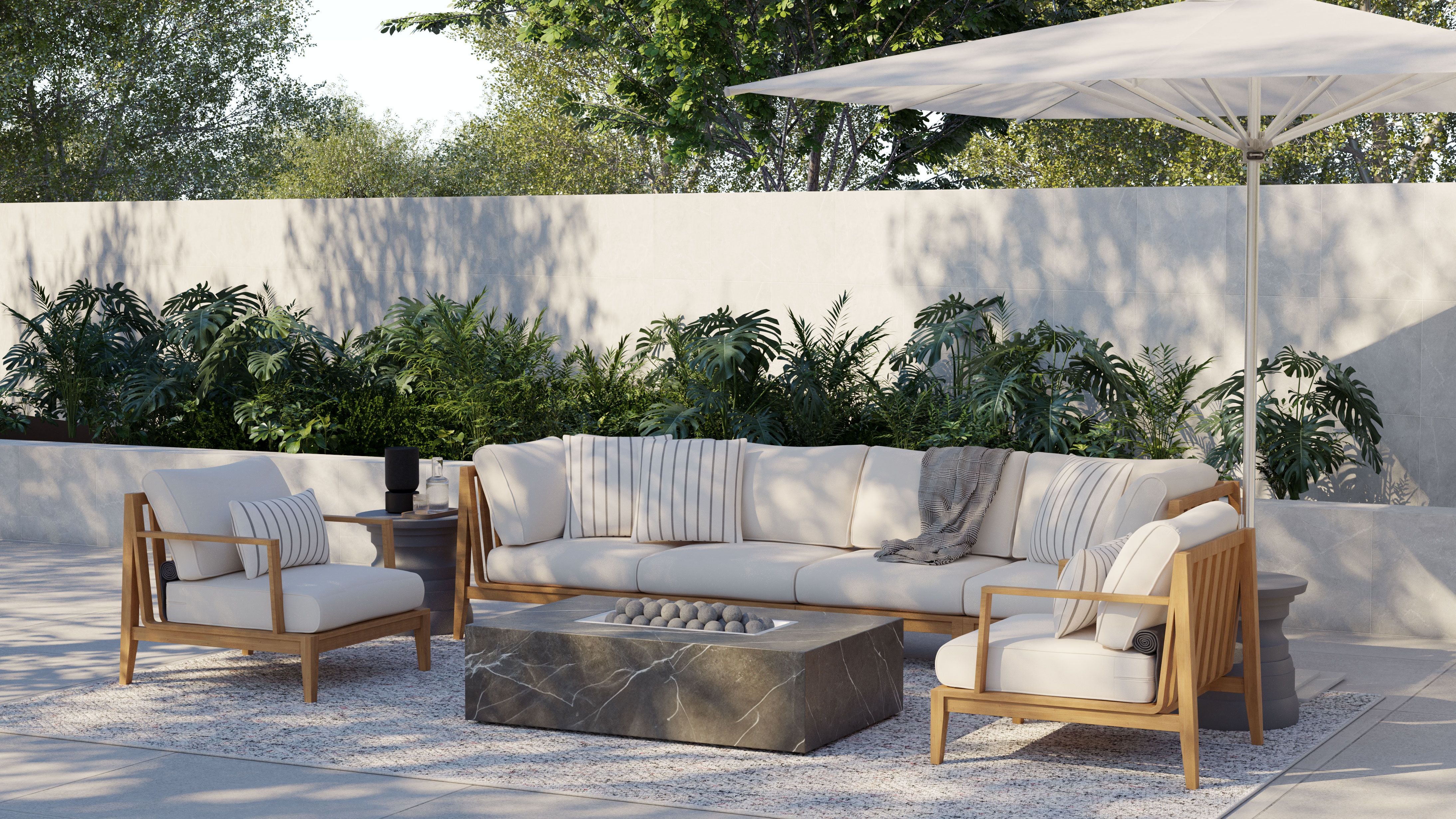 Teak outdoor loveseat sofa featuring a slatted wood frame and beige cushions, accented with a striped pillow, set in a bright outdoor space.-teak outdoor sofa-outer