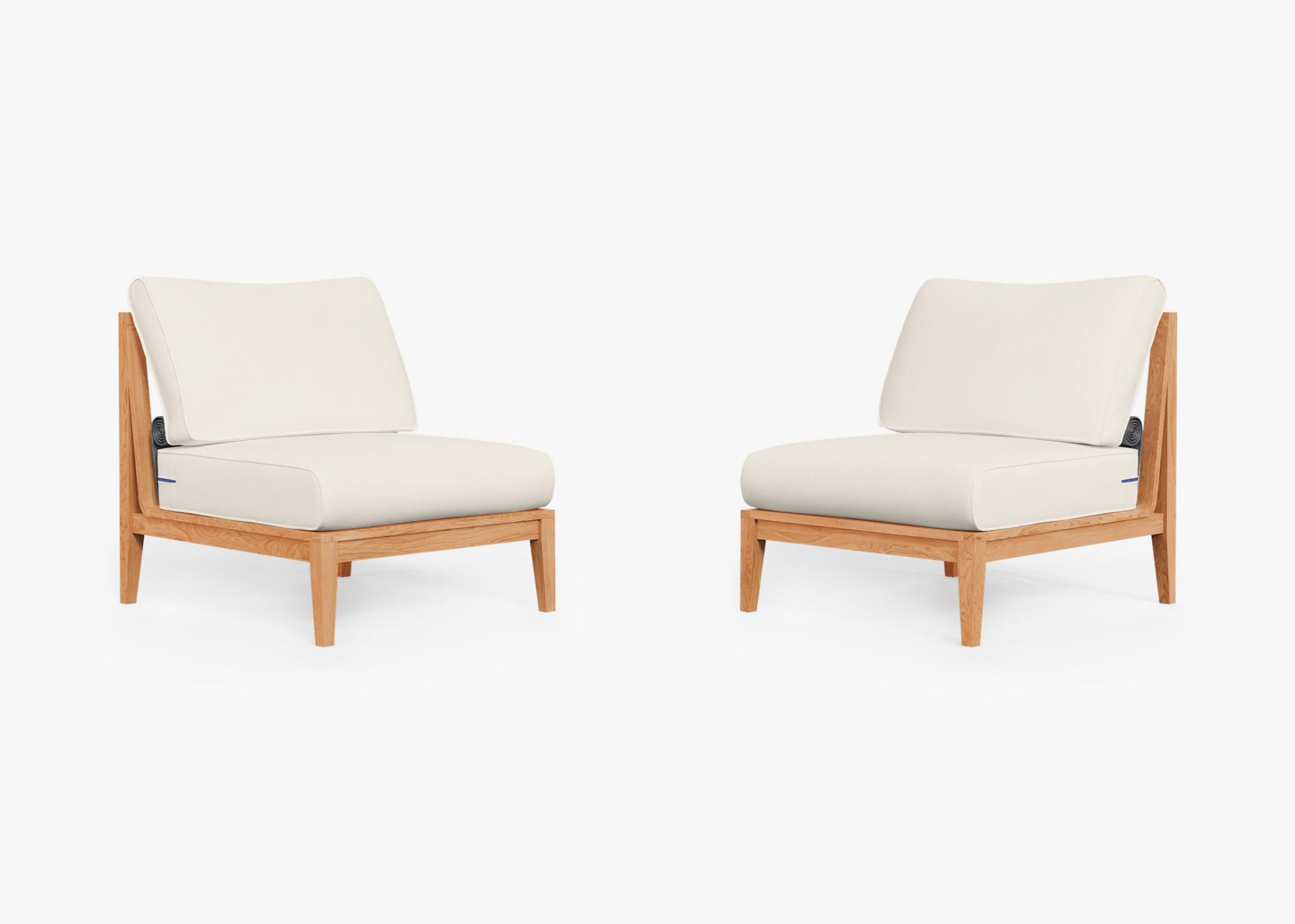 Teak outdoor armless chair and sofa set arranged for conversation, featuring cream cushions and a natural wood finish.-teak outdoor sofa-outer #color_palisades cream