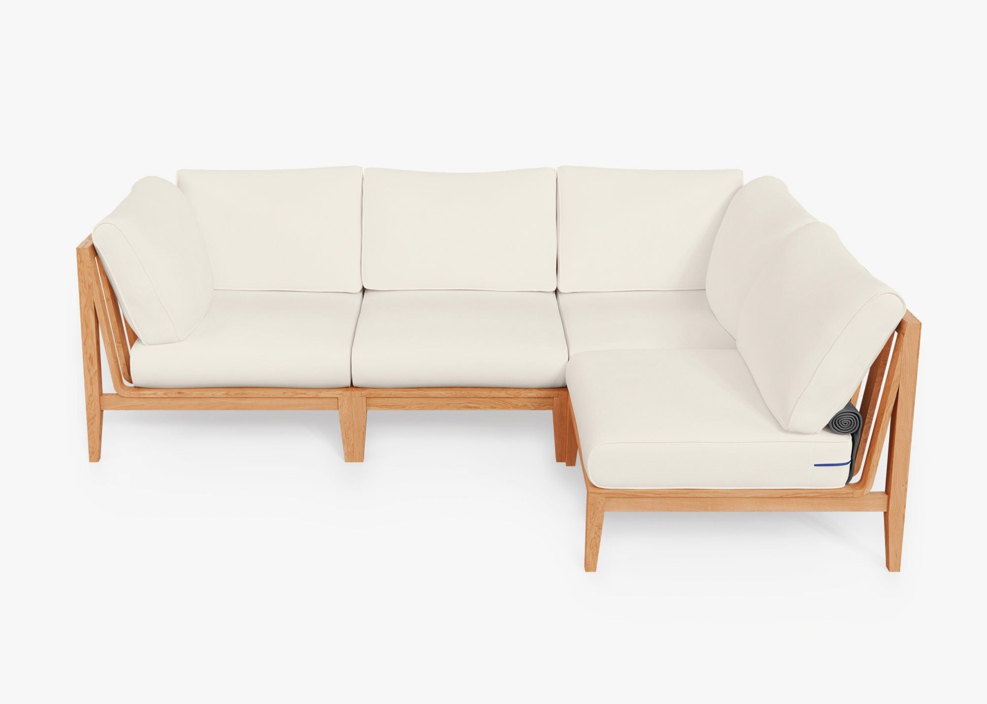 Teak outdoor L sectional sofa with 4 cream cushions arranged in an inviting corner seating setup.-teak outdoor sofa-outer #color_palisades cream