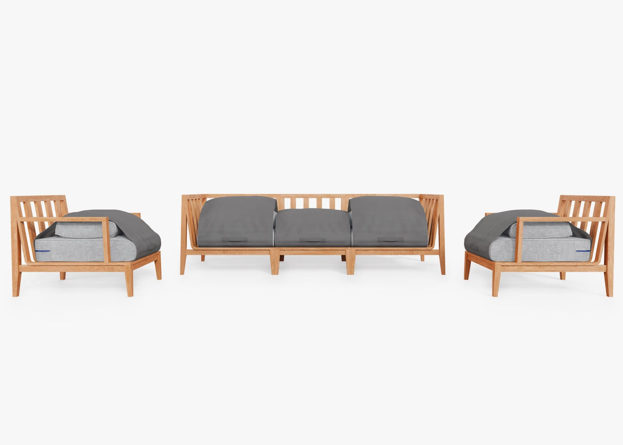 A teak outdoor sofa with matching armchairs, featuring gray cushions and a sturdy wooden frame, arranged on a patio setting.-teak outdoor sofa-outer #color_pacific fog gray